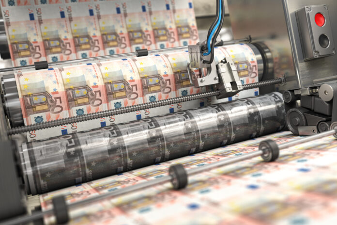 Printing money euro bills on a print machine in typography.. Fin